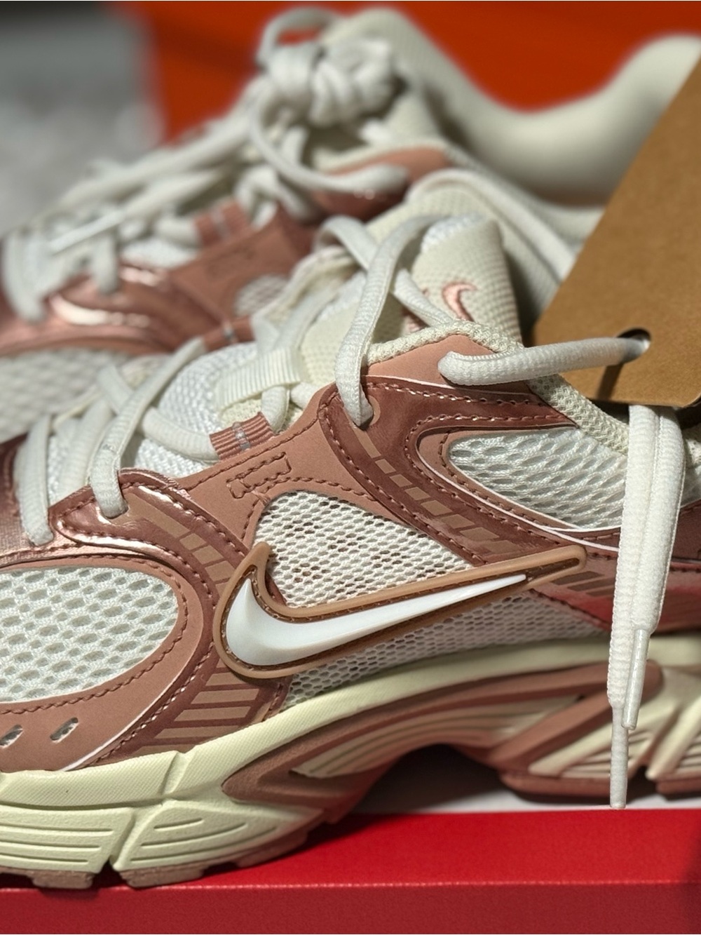 Nike Women's Rose Gold and White Mesh Sneaker